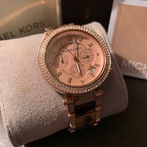 Rose gold MK watch.
